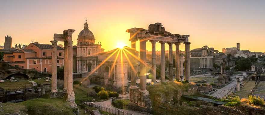 Sun rising over Roman ruins in Italy Sun rising over Roman ruins in Italy