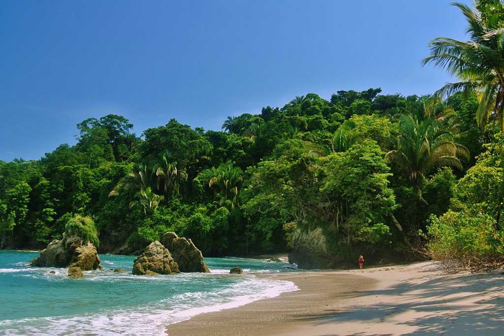 Woman walking on the beach in Costa Rica