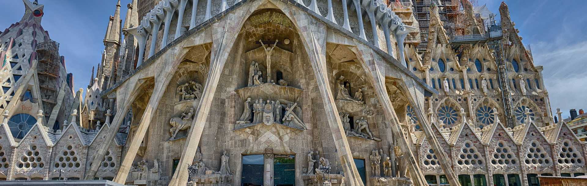Detailed panoramic view on the bottom part of Sagrada Familia in Barcelona, Spain.