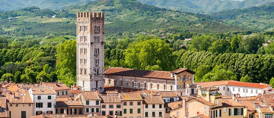 View of the city of Lucca and the chapel of the Basilica of St. Ferdinand - an ancient catholic church, Italy