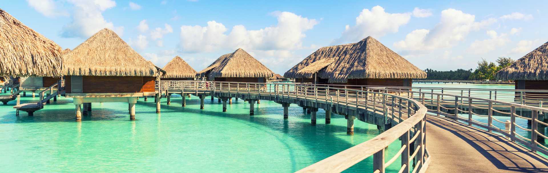 Overwater bungalows on a Tahiti vacation