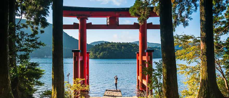 A Torii gate by lake in Hakone, Japan.