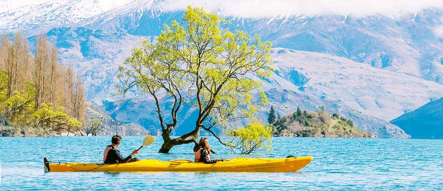 Couple kayaking Lake Wanaka in New Zealand