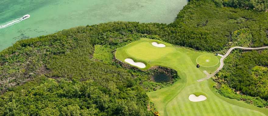 Golf course and lagoon in Mauritius Island Golf course and lagoon in Mauritius Island