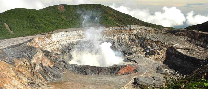 Walk the volcanic peaks and watch the steam rise right out of the crater at Poas volcano, Costa Rica