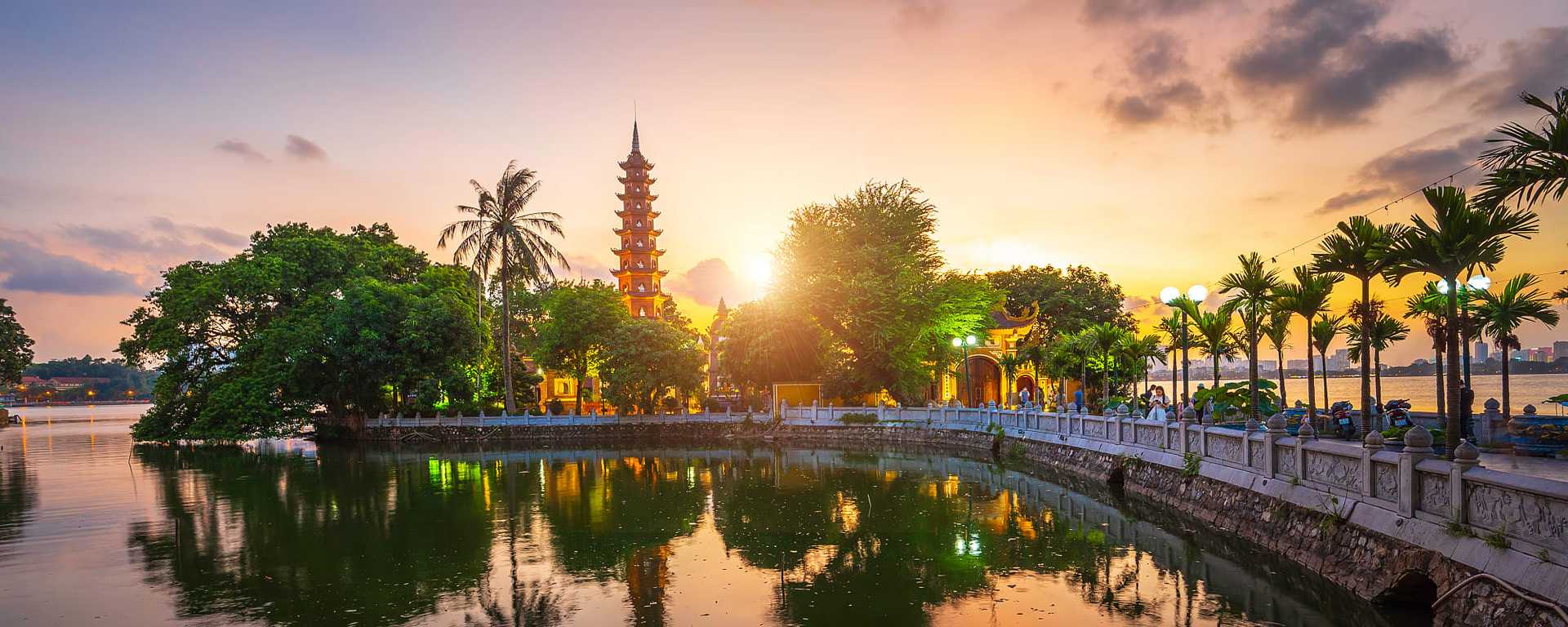Tran Quoc pagoda and sunset sky in Hanoi, Vietnam