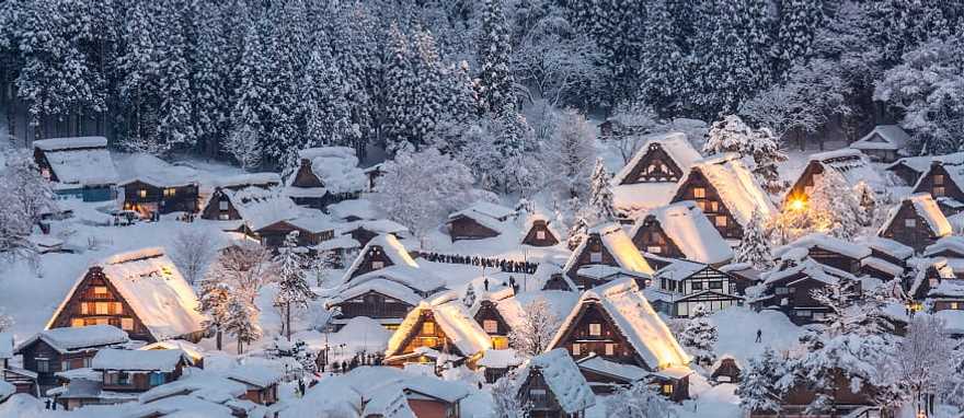 Traditional Japanese wood houses covered snow in Shirakawa-go
