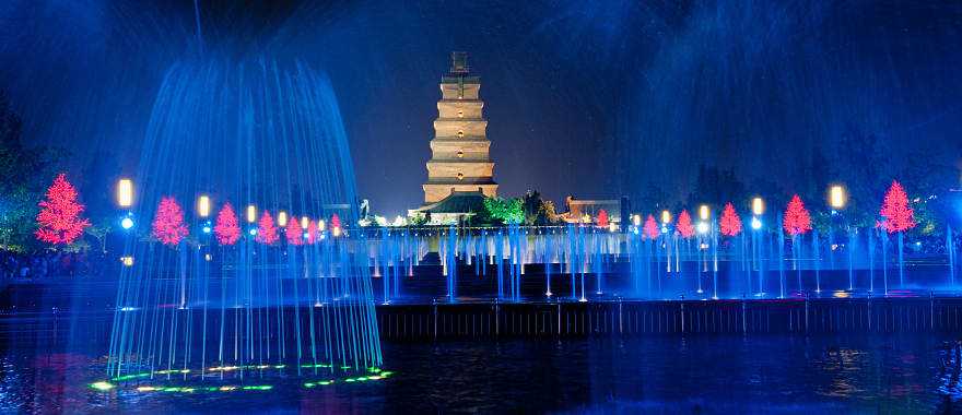 Illuminated water show at 1300-year-old Wild Goose Pagoda in Xian, China.