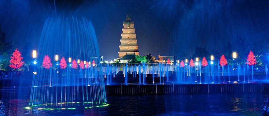 Illuminated water show at 1300-year-old Wild Goose Pagoda in Xian, China.