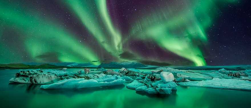 Aurora borealis over the Thingvellir National Park, Iceland