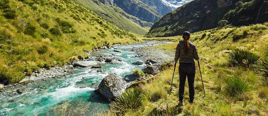 New Zealand mountain river hiker New Zealand mountain river hiker