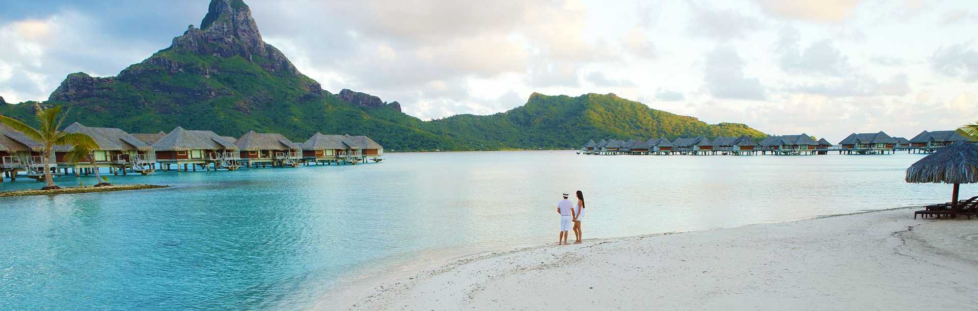 View of Bora Bora bungalows from beach.