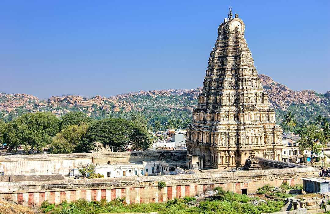 Virupaksha Temple, located in the ruins of ancient city Vijayanagar at Hampi, India Virupaksha Temple, located in the ruins of ancient city Vijayanagar at Hampi, India