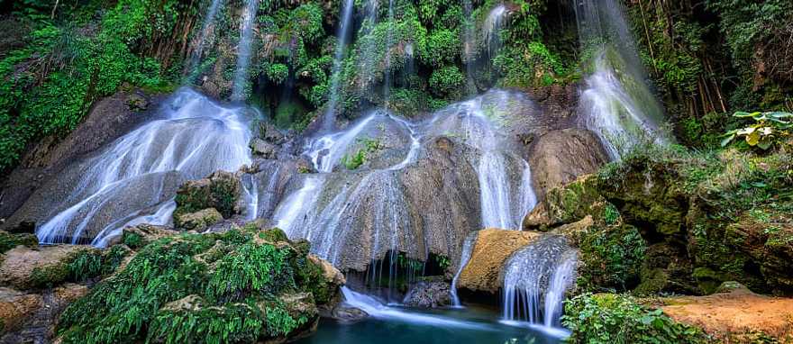 El Nicho Waterfall in Cuba El Nicho waterfall in the Escambray Mountains between Trinidad and Cienfuegos, Cuba