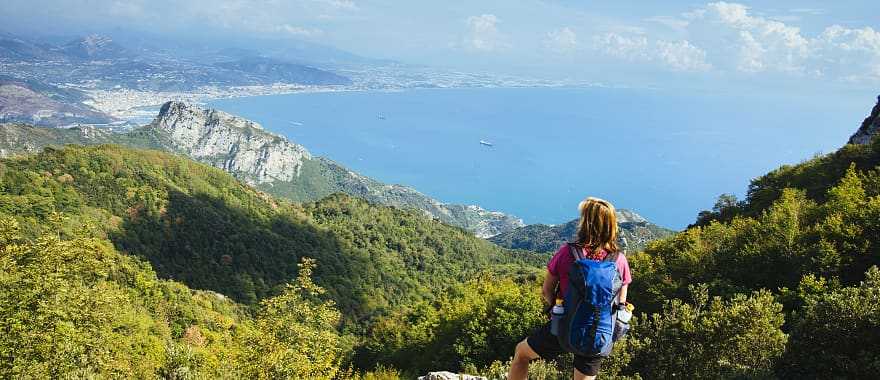 Hiker admiring the view along the Path of the Gods in the Amalfi Coast, Italy