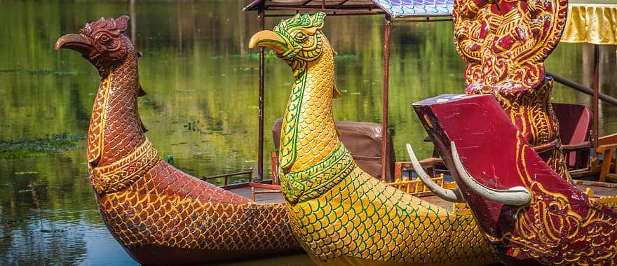 Boat on lake near Bayon temple in Cambodia. 