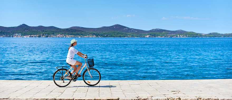 Woman cycling in Croatia 
