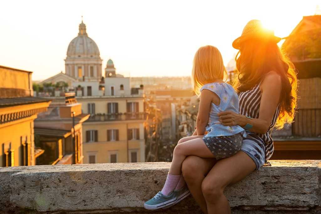 Mother and daughter overlooking Rome