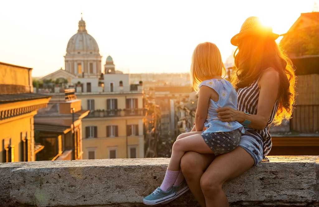 Mother and daughter overlooking Rome