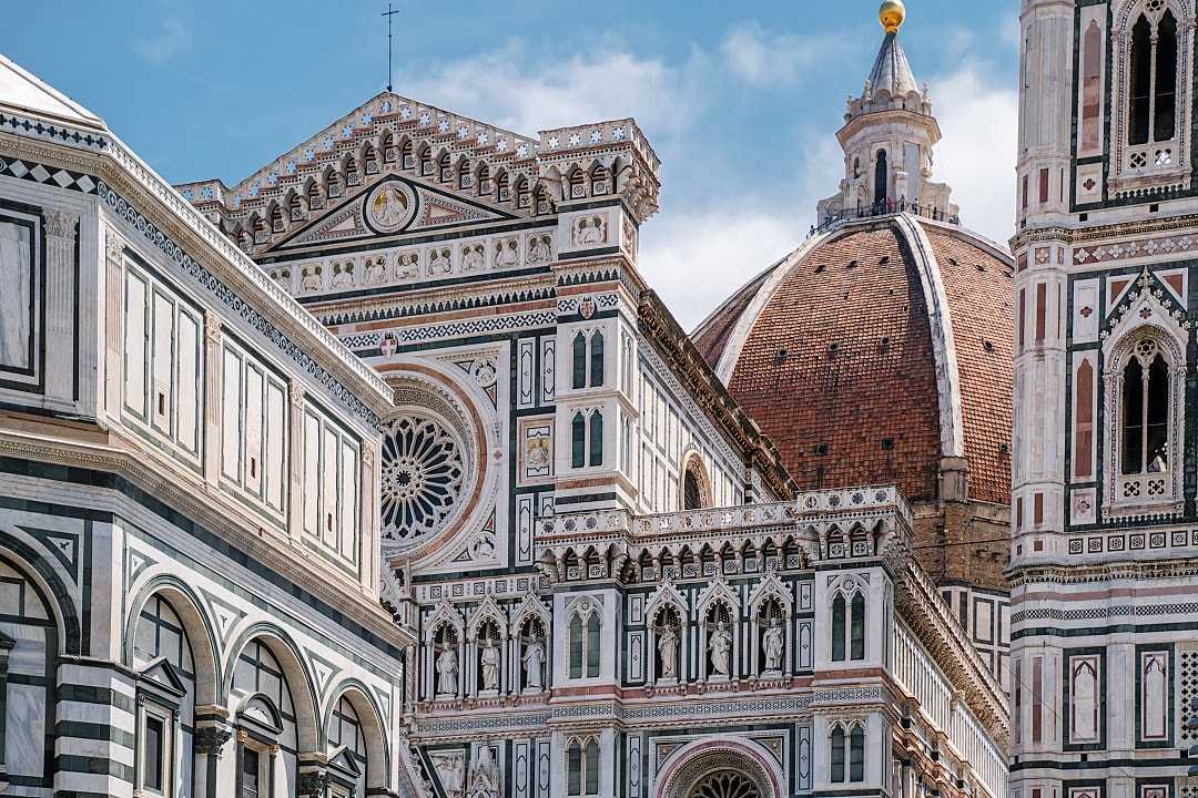 Architectural detail and the dome of Cathedral of Santa Maria del Fiore in Florence, Italy