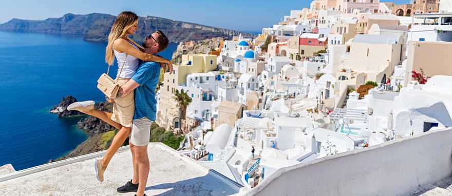 Couple at Santorini island in Greece Couple at Santorini island in Greece