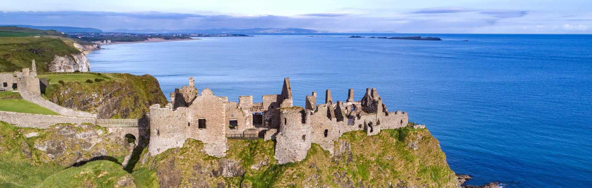 Ruins of Dunluce Castle on the coastal cliffs in County Antrim, Northern Ireland
