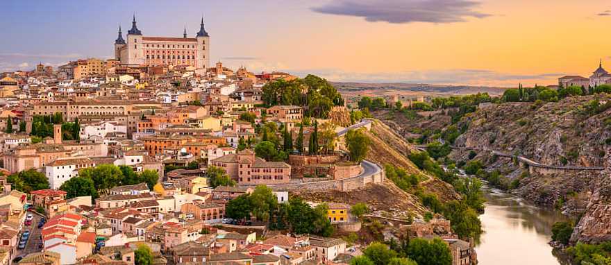 View of Alcazar and Tagus river in Toledo, Spain View of Alcazar and Tagus river in Toledo, Spain