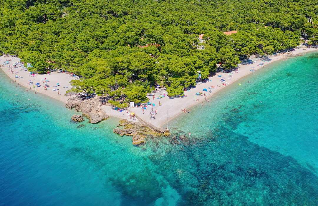 Punta Rata Beach in Brela, Croatia Aerial view of Punta Rata Beach in Brela, Croatia