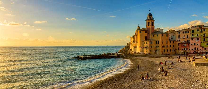 Genoa Camogli is a small village in Liguria on the shores of the Mediterranean Sea.   The beauty of land and sea at sunset, Genoa