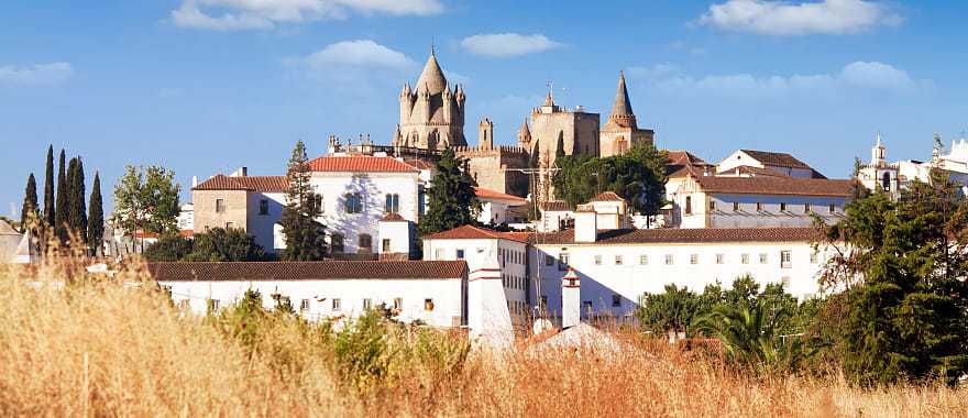 Washed buildings surrounding the Cathedral in Evora, Portugal
