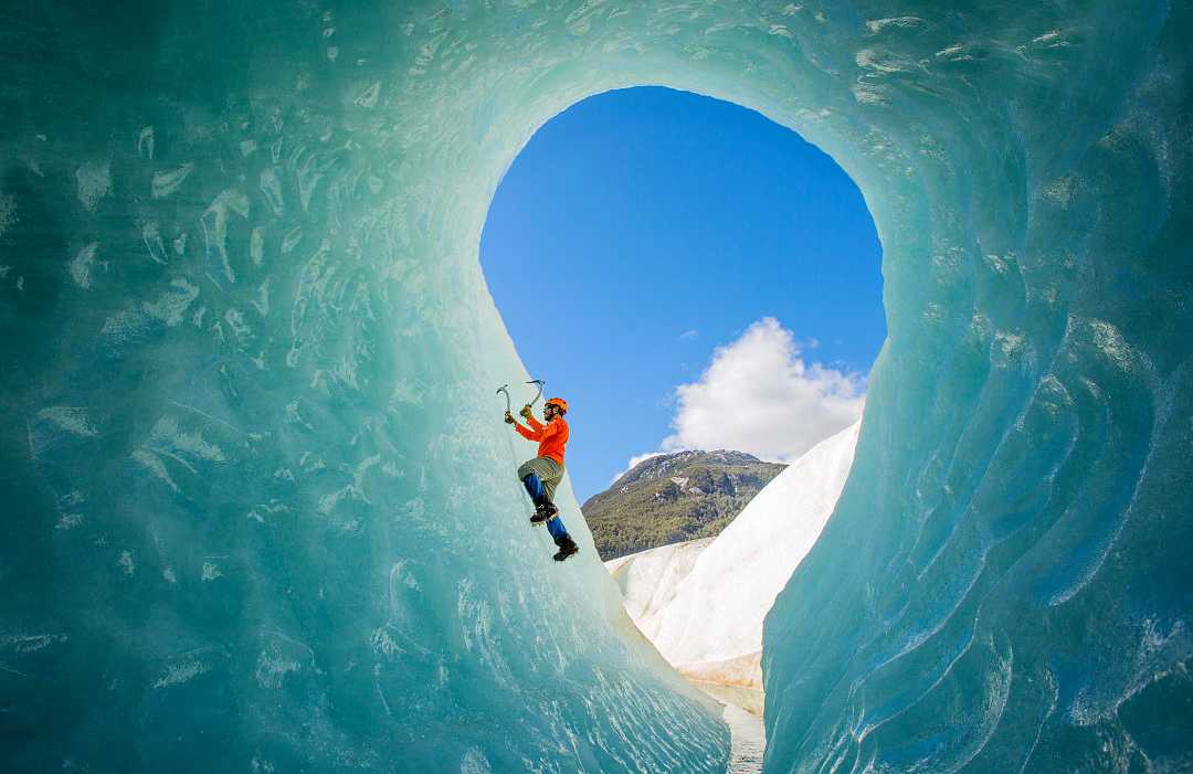 Ice climber inside glacier in Patagonia, Chile.