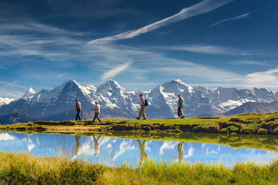 Seniors hiking in the Swiss Alps