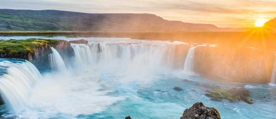 Waterfall of the gods at sunset in Iceland