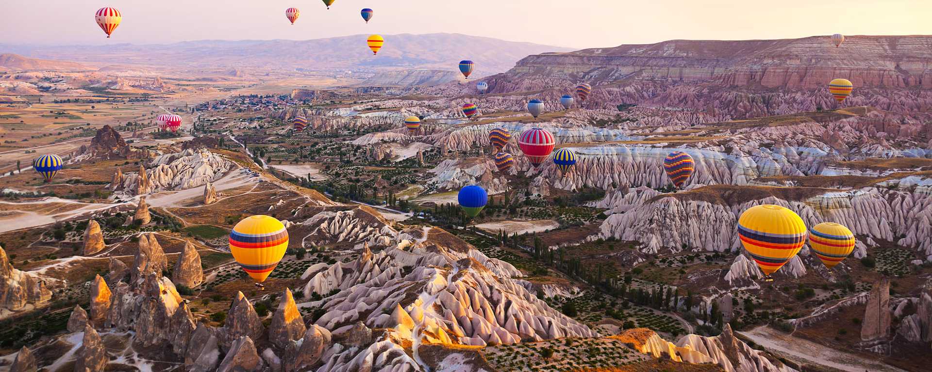 Hot air balloons in flight over Cappadocia, Turkey