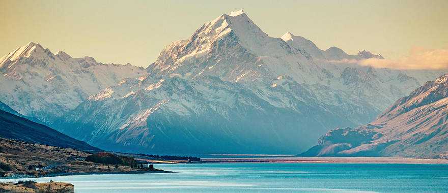 The dramatic peak of Mount Cook will dominate the skyline.