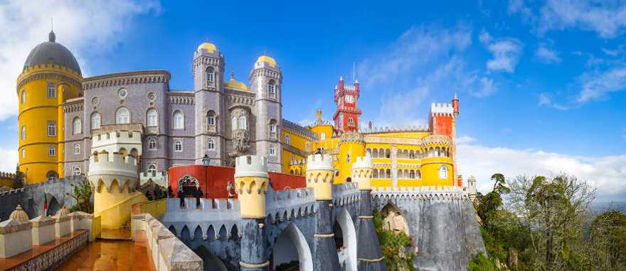 Fantastic Pena Palace on a high cliff above Sintra Fantastic Pena Palace on a high cliff above Sintra