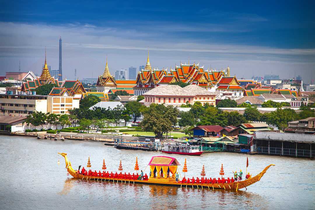 View of the Grand Palace on the Chao Phraya River in Bangkok 
