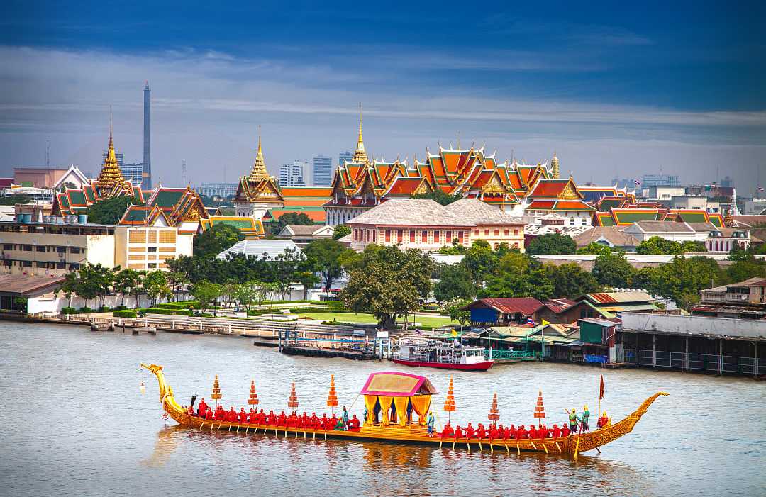 View of the Grand Palace on the Chao Phraya River in Bangkok 