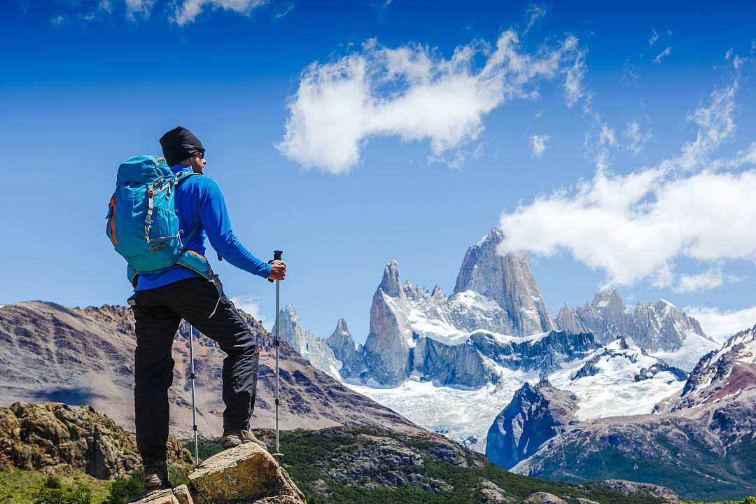Hiker enjoying the view of Mount Fitz Roy, Patagonia