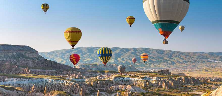 Hot air balloon floating above Cappadocia, Turkey.