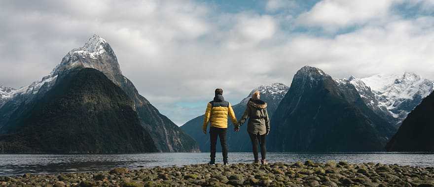 Couple at Milford Sound in New Zealand