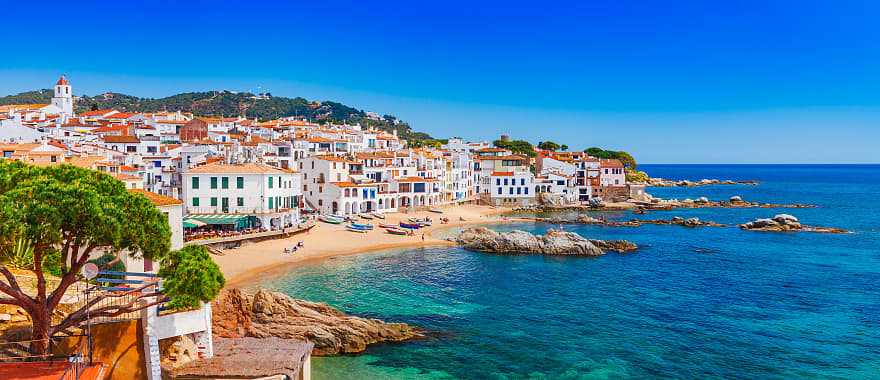 Blue bay and beach of Coastal town of Calella de Palafrugell in the Costa Brava Region of Spain