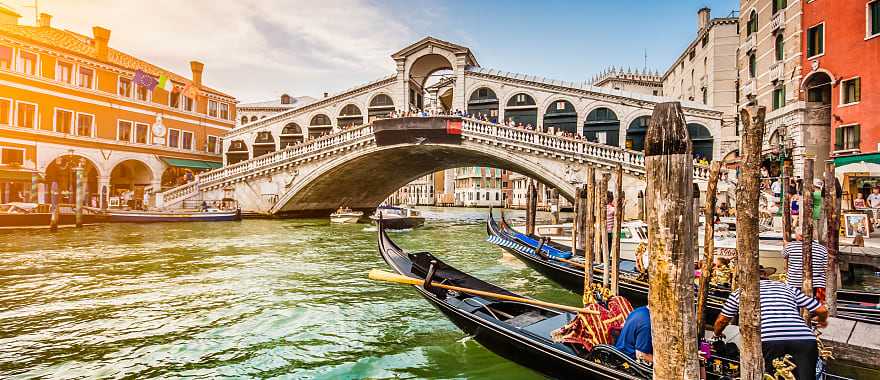 Rialto Bridge on Venice canal in Italy