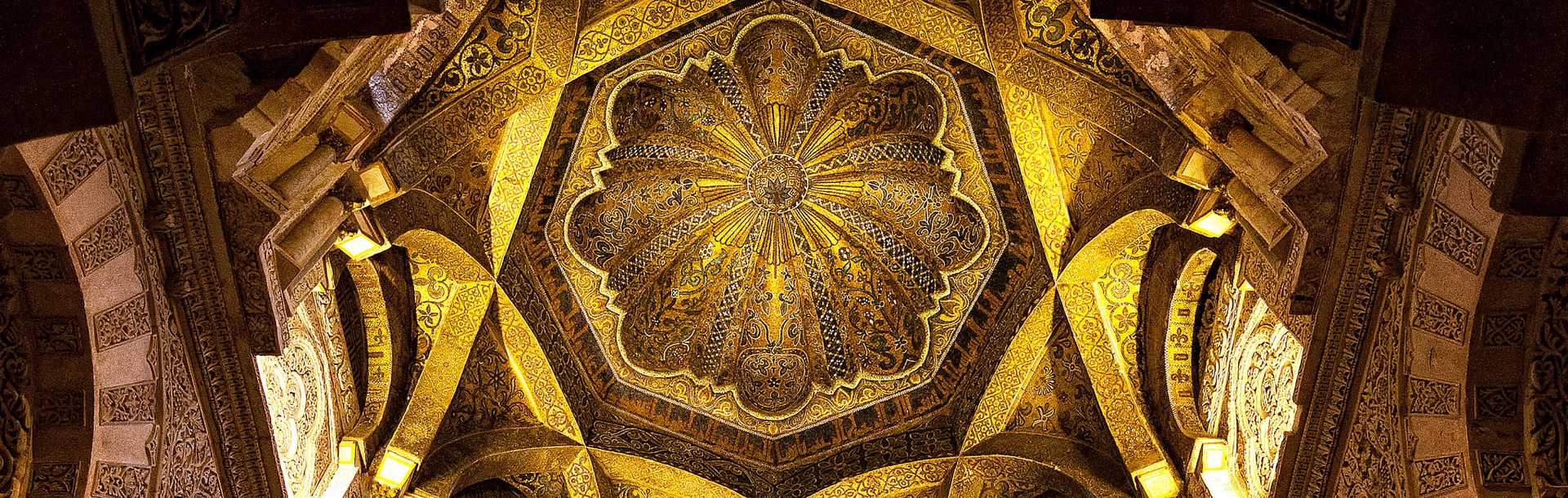 Architectural detail showcasing the golden dome of the Mosque of Cordoba