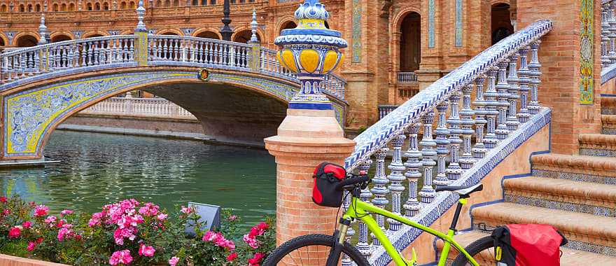 Touring bicycle parked at Plaza de España in Seville, Spain