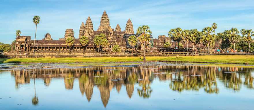 Status of Angkor Wat in sunset the golden shine at Siem Reap, Cambodia Status of Angkor Wat in sunset the golden shine at Siem Reap, Cambodia