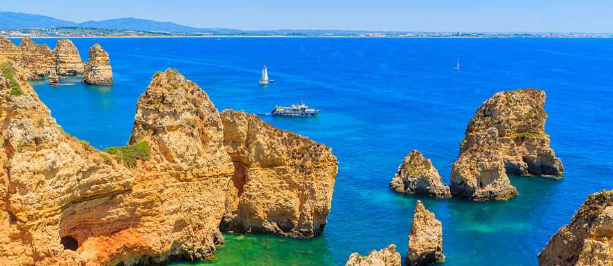 Boats on the water at Ponta da Piedade in Portugal. Boats on the water at Ponta da Piedade in Portugal.