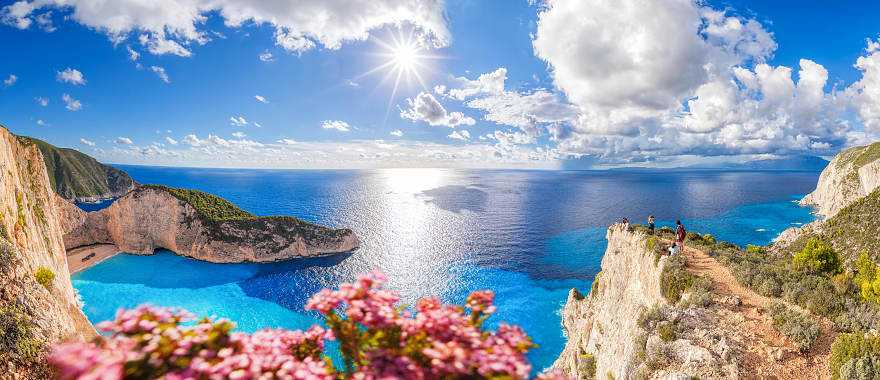 Navagio beach with shipwreck and flowers on Zakynthos island in Greece.