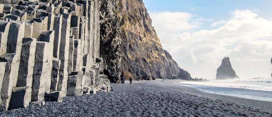 The black sand beach of Reynisfjara and the mount Reynisfjall, Iceland