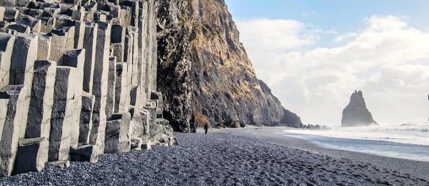 The black sand beach of Reynisfjara and the mount Reynisfjall, Iceland